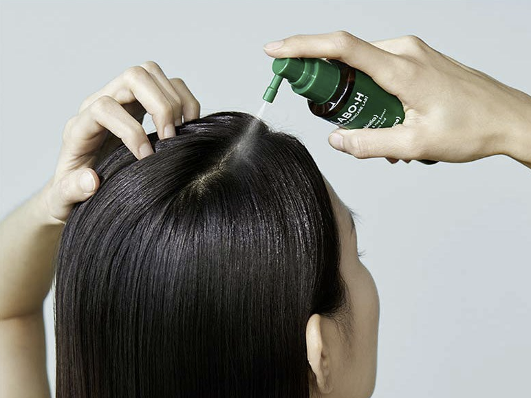 Korean hair care products K-beauty treatment bottles flat lay